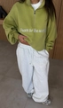 Detail of green half-zip sweatshirt with white Peace to the world embroidery - S / Yellow-Green