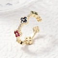 Adjustable gold ring with colorful clover-shaped gemstones in red, blue, and green - Flower Style / Gold Multicolor