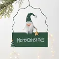 Christmas iron door sign featuring a green hat gnome and Merry Christmas text - Green Gnome Plaque
