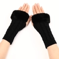 Detailed close-up of black knitted fingerless gloves with soft faux fur cuffs for winter - One Size / Black