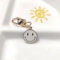 Golden alloy keychain with white enamel smiley face pendant for bags and purses - Round Face Single White