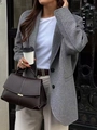 Chic dark brown leather handbag with gold clasp, styled with a grey blazer and office wear - Gray / S