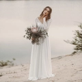 Elegant white long sleeve lace wedding dress with V-neckline and chiffon A-line skirt - S / White