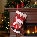 Red burlap Christmas stocking with 3D snowman figure and festive plaid accents - Snowman