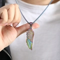 Macro shot of colorful iridescent feather wing pendant on a fine metal chain link - Pendant Only (No Chain) / Rainbow