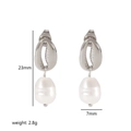 Detailed view of silver shell earrings with irregular pearls showing 23mm height and 7mm width - Silver Shell Pearl Earrings (TE6403-S)