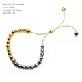 Detail showing 6mm gold and silver beaded copper bracelet with adjustable slider chain - 5mm Gold Silver Two-tone
