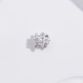 Macro detail of S925 sterling silver star bead with sparkling pavé zircon stones - Star Style / Silver