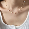 French style 18k gold plated titanium necklace with white marble stones on model - White Natural Stone (P018)