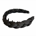 Detail of black satin padded headband featuring anti-slip teeth for high skull top hair style - Black