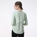 Dames yoga top met lange mouwen in licht mintgroen en ademend mesh laagjesdesign - S / Fruitgroen
