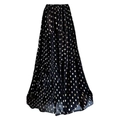 Close-up of black mesh maxi skirt with elegant gold polka dot pattern and tiered hem - One Size / Skirts