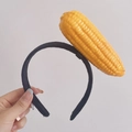 Cute vegetable headband featuring a realistic yellow corn design on a black band - Corn