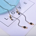 Cadena para gafas en negro y oro con colgantes de piruleta y lazos ajustables - Piruleta Negro Oro