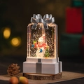 Linterna de bola de nieve de Navidad en forma de regalo con muñeco de nieve y brillo - Blanco - Muñeco de Nieve