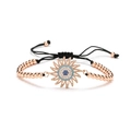 Bracciale girasole in oro rosa con zirconi blu e cordino nero intrecciato regolabile - Oro rosa