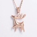 Close-up of rose gold reindeer pendant with detailed metal luster on a cross chain - 45cm Chain / Rose Gold