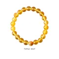 Macro detail of 8-10mm translucent citrine crystal beads on a stretch bracelet - Citrine Single Strand Style (WB335)