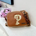Brown crossbody bag featuring a leopard print P logo and a wide textile strap - Coffee
