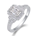 Macro view of emerald-cut moissanite stone and pavé setting on a 925 silver ring - US 7 / Emerald Cut Style (R13053)