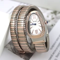 Macro view of serpent quartz watch featuring crystal bezel and rose gold teardrop dial - Rose Gold Gradient White Dial