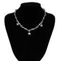 Detail of silver thorn chain necklace with three pentagram star pendants on a model - Silver (06205)