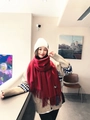 Red thick wool scarf with fringe trim for winter, worn over a beige knitted cardigan - Tassel Style / 260g (200x70cm) / Burgundy