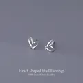 Minimalist S999 sterling silver heart stud earrings with a polished finish for women - Hollow Heart