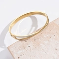 Golden double-layer bracelet with twisted chain and sparkling diamonds on stone - 2021-Gold-Double Twist Zirconia