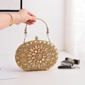 Luxury oval evening clutch bag featuring yellow floral rhinestone pattern and gold handle - Gold