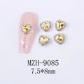 Detail view of 7.5x8mm yellow heart nail art gems with white crystal borders - Golden Yellow Heart Silver Base (MZH-9085)