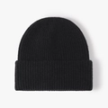 Classic black ribbed knit beanie with cuffed design for winter warmth and outdoor style - Black