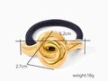 Close-up of black hair tie with 5.2cm golden metal twist knot decoration, weight 18g - Gold Knotted Style