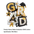 Detail of graduation GRAD balloon set with mortarboard and diploma, size 90x108cm - Matte Graduation GRAD Letters Balloon