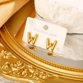 Polished gold-plated stainless steel stud earrings featuring minimalist letter W design - Letter W
