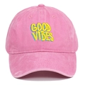 Close-up of GOOD VIBES colorful embroidery on a pink washed cotton baseball cap - Pink