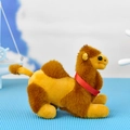 Detailed side view of a cute plush camel keychain with a red ribbon and gold bell collar - Bead Chain Style / Brown