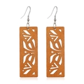 Macro shot of rectangular hollowed-out brown wood earrings with smooth natural textures - Style 40/Rectangular Wood Hollow Texture