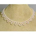 Handcrafted woven freshwater pearl necklace with elegant lace fringe and white pearls - Fishing Line Woven Lace Style