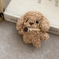 Close-up of curly brown teddy dog hair accessory with classic style wooden button - Brown Curly Teddy Dog (Duckbill Clip)