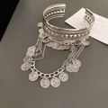 Macro detail of silver vintage cuff bracelet with chain tassels and coin charms - Silver Retro Coin Tassel Style (10#)