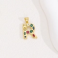 Detailed view of golden letter R pendant featuring vibrant multi-colored baguette crystals - Letter R