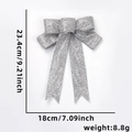 Silver glitter Christmas bow decoration with 23cm length and 18cm width dimensions - Silver