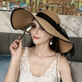 Elegant wide brim straw sun hat in natural tan with black ribbon and side bow accent - One Size / Khaki with Black Trim