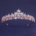 Detail of rose gold bridal tiara with leaf-shaped crystals on dark blue background - Rose Gold