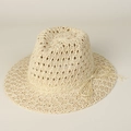 Detailed close-up of intricate hollow weave pattern and bow on cream straw sun hat - M(56-58cm) / Beige