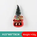 Christmas glass ornament with red gift bag, small bear and decorated green tree - Gift Bag with Christmas Tree