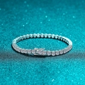 Polished 925 sterling silver tennis bracelet with moissanite stones on green glitter background - 925 Silver / 15.5cm (10pt Stone)