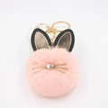 Portachiavi pompon a forma di gatto in ecopelliccia rosa con baffi dorati per borse - Rosa