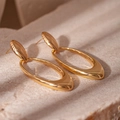 Minimalist geometric 18K gold-plated oval drop earrings with polished finish on stone surface - Gold Double Loop Oval Drop Earrings (Silver Earring Post)